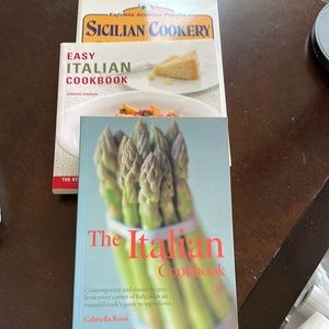 Three soft cover Italian cookbooks